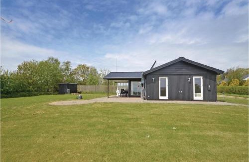 Remmer Strand House | Two-Bedroom Holiday Home With A Fireplace In Struer
