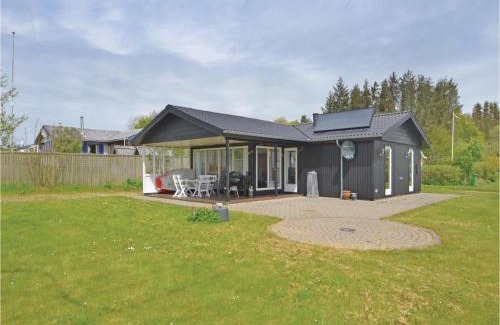 Remmer Strand House | Two-Bedroom Holiday Home With A Fireplace In Struer