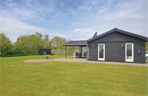 Remmer Strand House | Two-Bedroom Holiday Home With A Fireplace In Struer