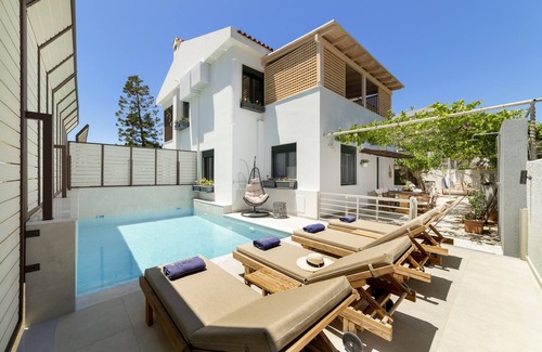 Koutsouras Condo | Two bedroom luxury condo with private patio with vineyard & BBQ near beach