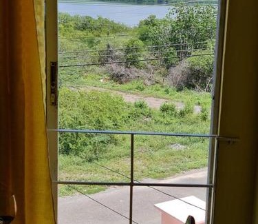 Hellshire Apartment | Two bedroom. Walk to beach. Free Wi-Fi & free parking