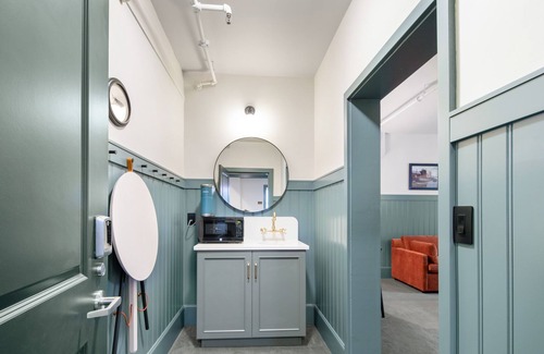 Poulsbo House | Two next-door rooms at Hotel Scandi with city views, kitchenette, & parking