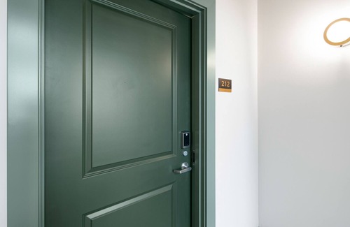 Poulsbo House | Two next-door rooms at Hotel Scandi with city views, kitchenette, & parking