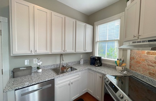 Beach Institute House | Two-story historic home along quiet streets and a gated courtyard. Free parking.