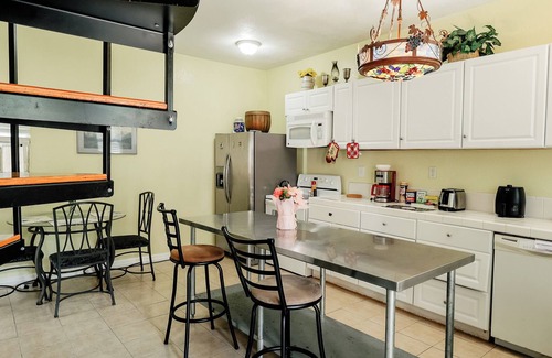 San Jacinto House | Two Story Yellow home