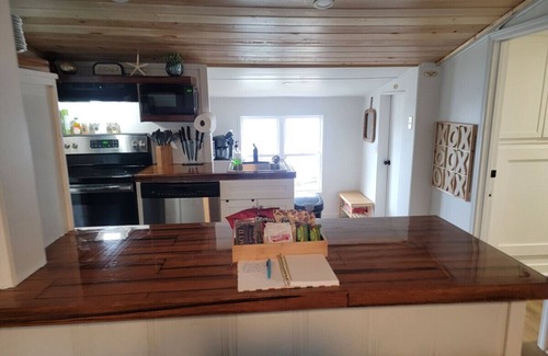 Cedar Point House | Two waterfront homes with endless adventure, hottub, kayaks, two jonboats, fishing, and three miles to beach