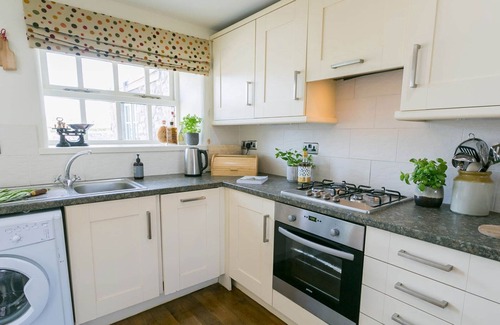 Pentraeth Cottage | Ty Gwair - a cosy fire that sleeps 4 guests in 2 bedrooms