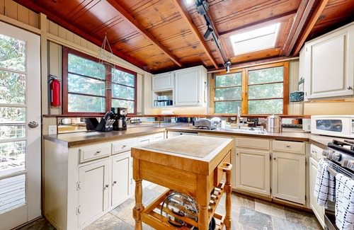 Forestville House | Ultra-private riverfront retreat with private hot tub & multi-tiered deck