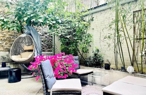 Porte-Dauphine Apartment | Un appartement de deux chambres climatisé avec un jardin privatif près de Trocadero