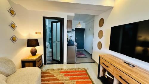 Central Province Apartment | UN approved snug studio with gym