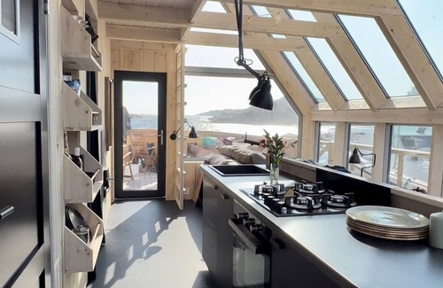 Kvenvær Boat Rental | Unforgettable Floating Suite, located in the beautiful Kvenvær archipelago