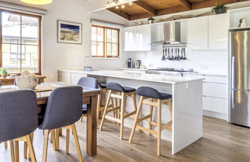 East Jindabyne House | Uninterrupted views of Lake Jindabyne from the balcony.
