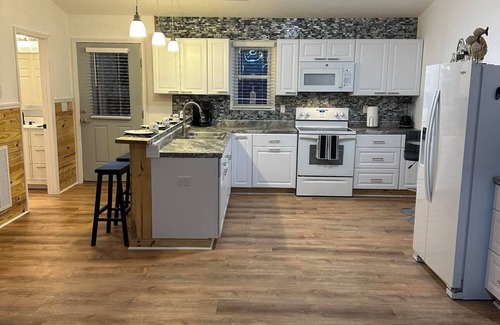 Colington Apartment | Unique 2-bedroom upstairs unit, just 13 miles to Outer Banks. Close to shopping!