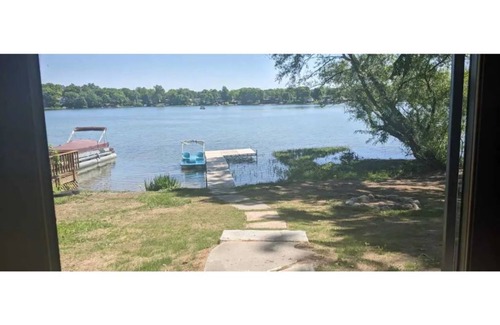 Howe Cottage | Unique Lakeside Retreat with Pedal Boat for a Relaxed, Pet-Friendly Getaway!