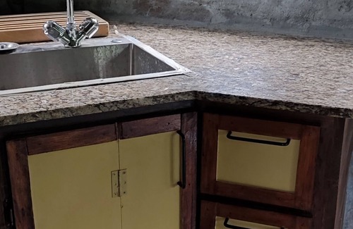 Georgetown Cottage | Unique river stone (tiny house) cottage on an off-grid location