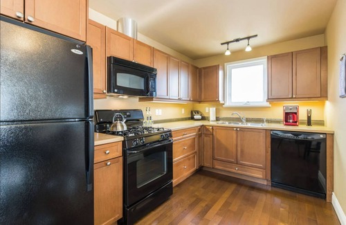 Point Edward Condo | Unique spacious upper Condo Suite. Steps from waterfront