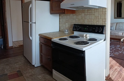 Holdrege Apartment | Uniquely comfy 2nd story, private entrance, outdoor balcony, fence, off street