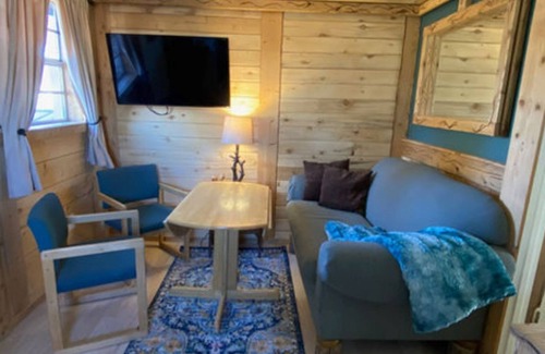 Cedaredge Cabin | Unit 9 at the Cedaredge Lodge: Creekside Comfort with a Touch of Mountain Magic.
