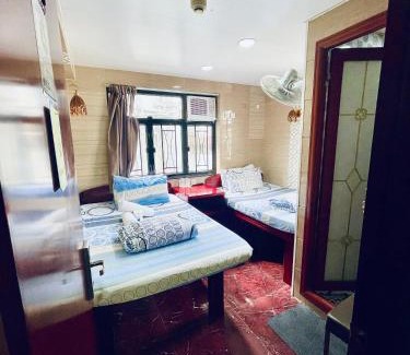 Tsim Sha Tsui House | United Co-Operate Guest House (7/F)