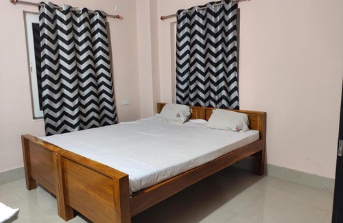 Bhubaneshwar House | Unnmadana - Cozy room in home stay bhubaneswar