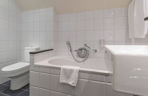 Municipality of Kerkrade Hotel | Unwind in Historic Farmhouse Room Near Maastricht City Center