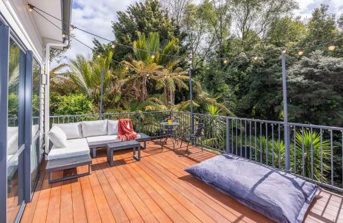 Hamilton House | Unwind in Style- Deck with Lush Green Backdrop