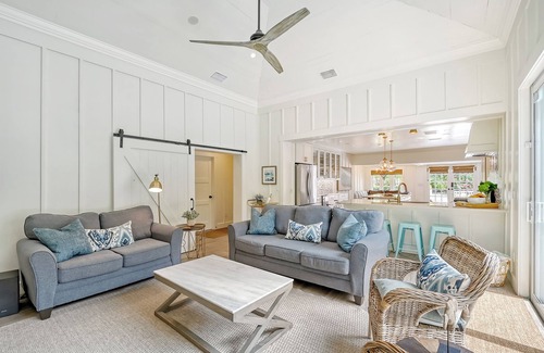 Holmes Beach House | Unwind Sunshine - heated pool, steps to the local's favorite beach, free bikes