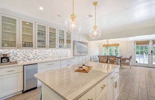 Holmes Beach House | Unwind Sunshine - heated pool, steps to the local's favorite beach, free bikes