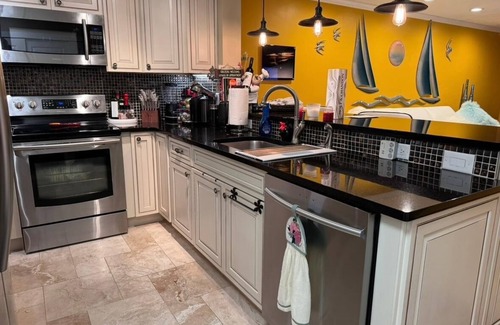 Whitney Beach Condo | Updated 2-bedroom pet friendly condo with stunning Bay views in Longboat Key