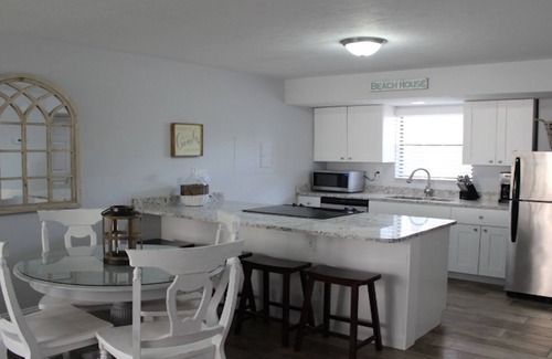 Marco Island Condo | Updated Cabana Unit with covered parking!7 night minimum.Now with washer dryer.