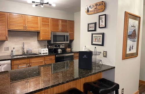 Steamboat Springs Condo | Updated/Clean Condo w/Heated Pool-Hot Tubs-Tennis-Grills-Patio on Green Space-Near Resort/Town Bus