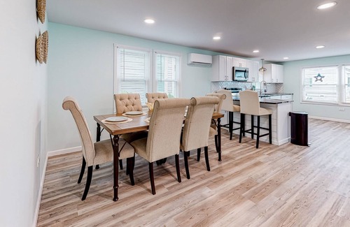 Montego Bay House | Updated dog-friendly home with gas grill, 2 pools, 2 tennis courts, fishing pier