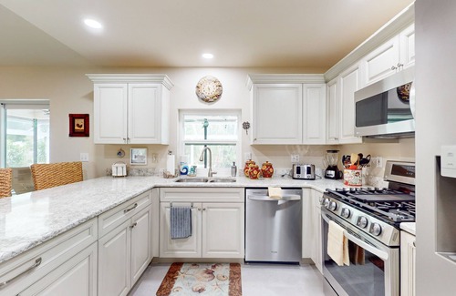 Caloosahatchee House | Updated home with private heated pool, enclosed lanai, patio, grill
