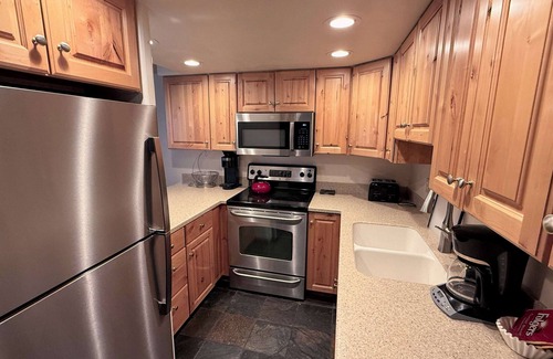 Vail Condo | Updated Kitchen Cabinets in Vail Condo with In Unit Washer Dryer