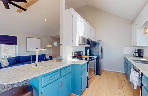 Livingston House | Updated lakefront home & studio with water views, beach, dock & game room