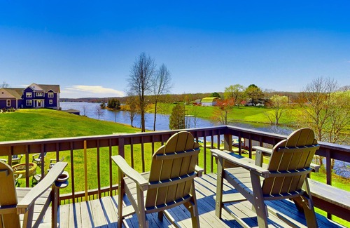 Livingston House | Updated lakefront home & studio with water views, beach, dock & game room