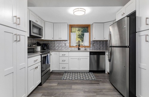 Vail House | Updated Townhome Overlooking Gore Creek, Deck with Private Hot Tub + Gas Grill, Parking for 4