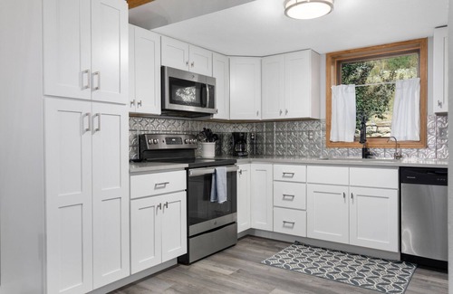 Vail House | Updated Townhome Overlooking Gore Creek, Deck with Private Hot Tub + Gas Grill, Parking for 4