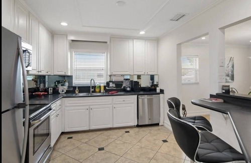 Naples Park House | Updated , Walk-Beach, New Paint, Fence, Sod, Patio BBQ, Fire Pit,- Dog friendly!