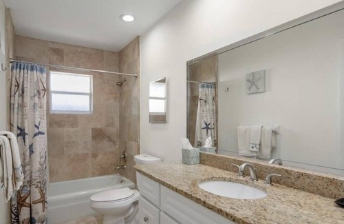 Naples Park House | Updated , Walk-Beach, New Paint, Fence, Sod, Patio BBQ, Fire Pit,- Dog friendly!