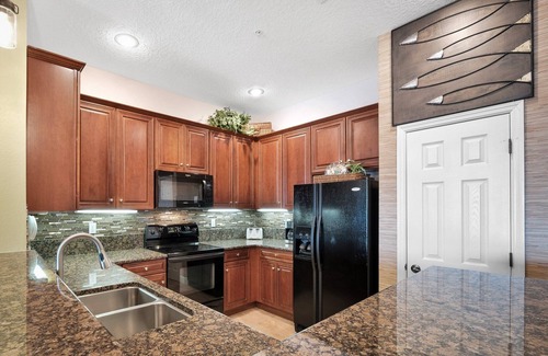 Palm Coast Condo | Updated waterfront condo just steps from the beach with beachfront pool and hot tub