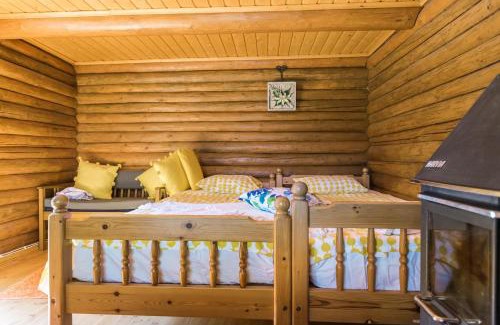 Ahtari Ski Chalet | Upea hiekkaranta mökki