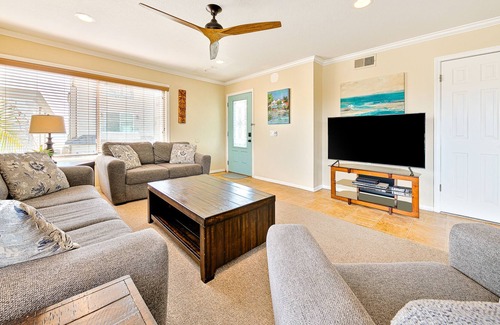 West Newport House | Upper condo walkable to the beach with decks, balcony, grill, views, & W/D