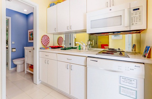 Maple City Condo | Upper-level condo with forest views, fireplace, soaking tub & high-speed WiFi