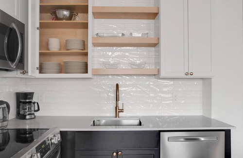 North Brookline Apartment | Upscale Brookline 1BR w/W/D, steps to Green Line, by Blueground