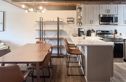 Fraser Condo | Upscale loft condo with fireplace, balcony, pool, hot tub & W/D