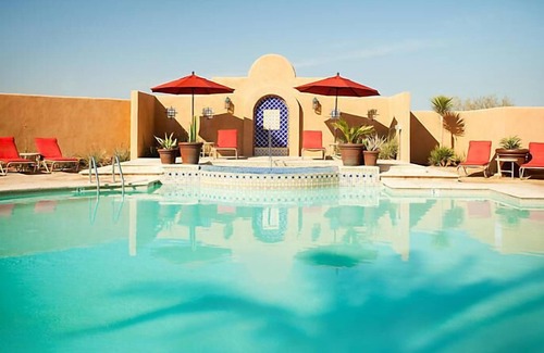 Cibola Vista Resort | UpScale Resort with Outdoor Heated Pool with a waterslide and a poolside bar, tennis court and gym