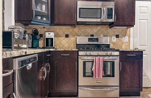 Cary House | Upscale Retreat in Cary, NC With Theater Room & Outdoor Fire Pit