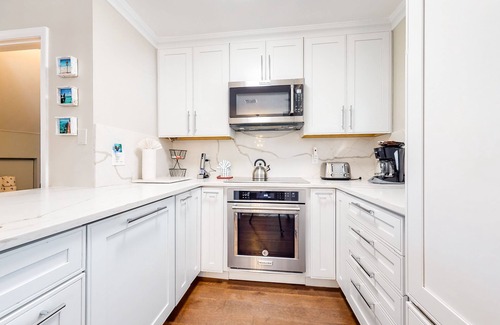 Key West House | Upscale Townhome w/Golf, Garden & Lake Views, Shared Pool, WiFi - Dogs OK
