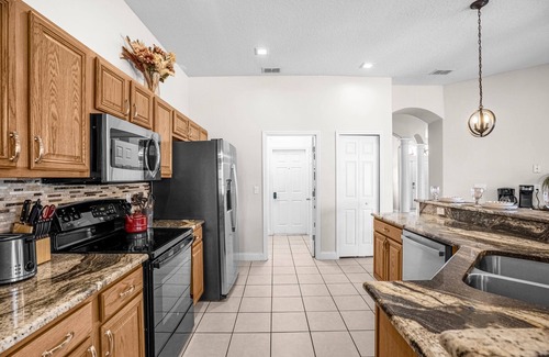 Buena Ventura Lakes House | Upstay - Waterside Home With Pool and Hot Tub
